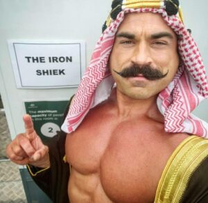 Brett Azar as The Iron Sheik